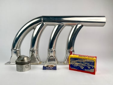 Vintage Blue Crown Racing Memorabilia Set with Manifold, Piston and Spark Plug