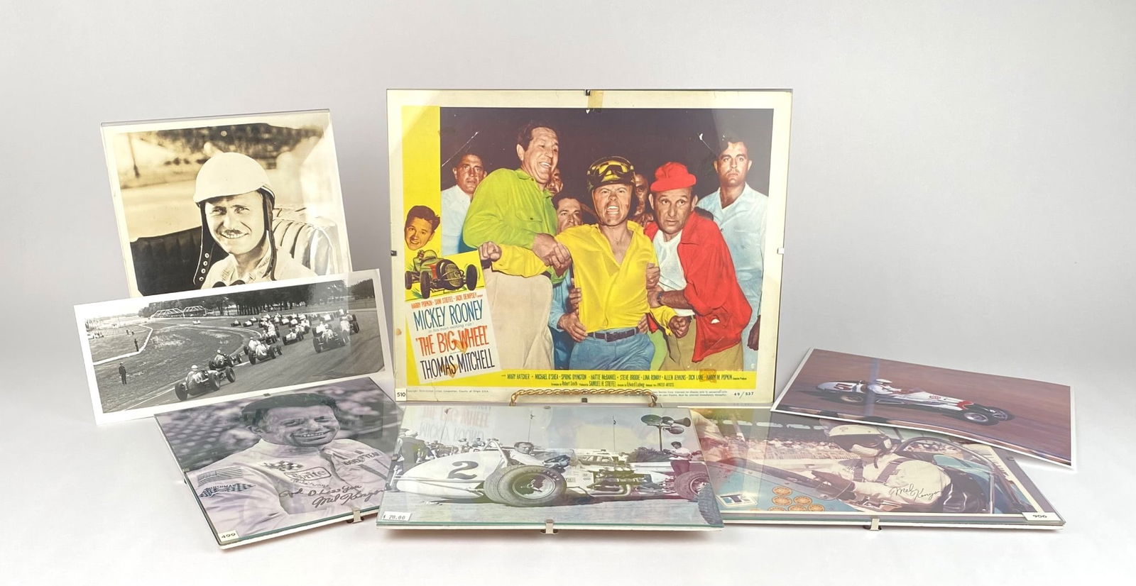 Lot of Mel Kenyon Racing Ephemera: Racing-related ephemera and photographs of Mel Kenyon. Features include a movie still from ‘The Big Wheel’ starring Mickey Rooney and Thomas Mitchell, vintage black-and-white images, autographed p