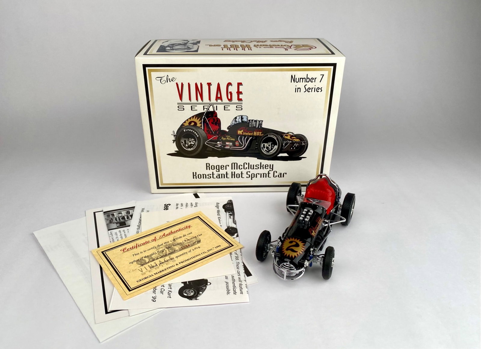 1:18 Scale Roger McCluskey 1963 Konstant Hot Sprint Car Model with Box and COA: 1:18 scale die-cast model of the 1963 Roger McCluskey Konstant Hot Sprint Car, manufactured by Georgia Marketing & Promotions Co. Inc. (1999). Includes original box, Certificate of Authenticity (seria