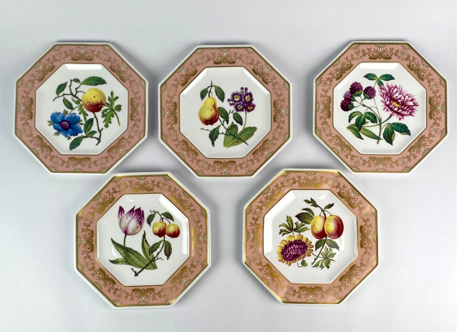 Set of Five Spode “The Cabinet Collection" Octagonal Plates: Set of five Spode fine bone China plates from “The Cabinet Collection,” each octagonal in form with pink and gilt borders surrounding botanical and fruit illustrations. The set includes “Ane
