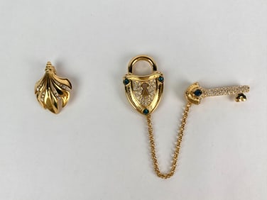 Nolan Miller and Kenneth Jay Lane Gold Tone Brooch and Pendant Set