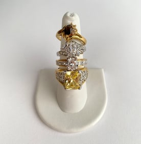 Lot of Four Gold-Tone & Silver-Tone Rings