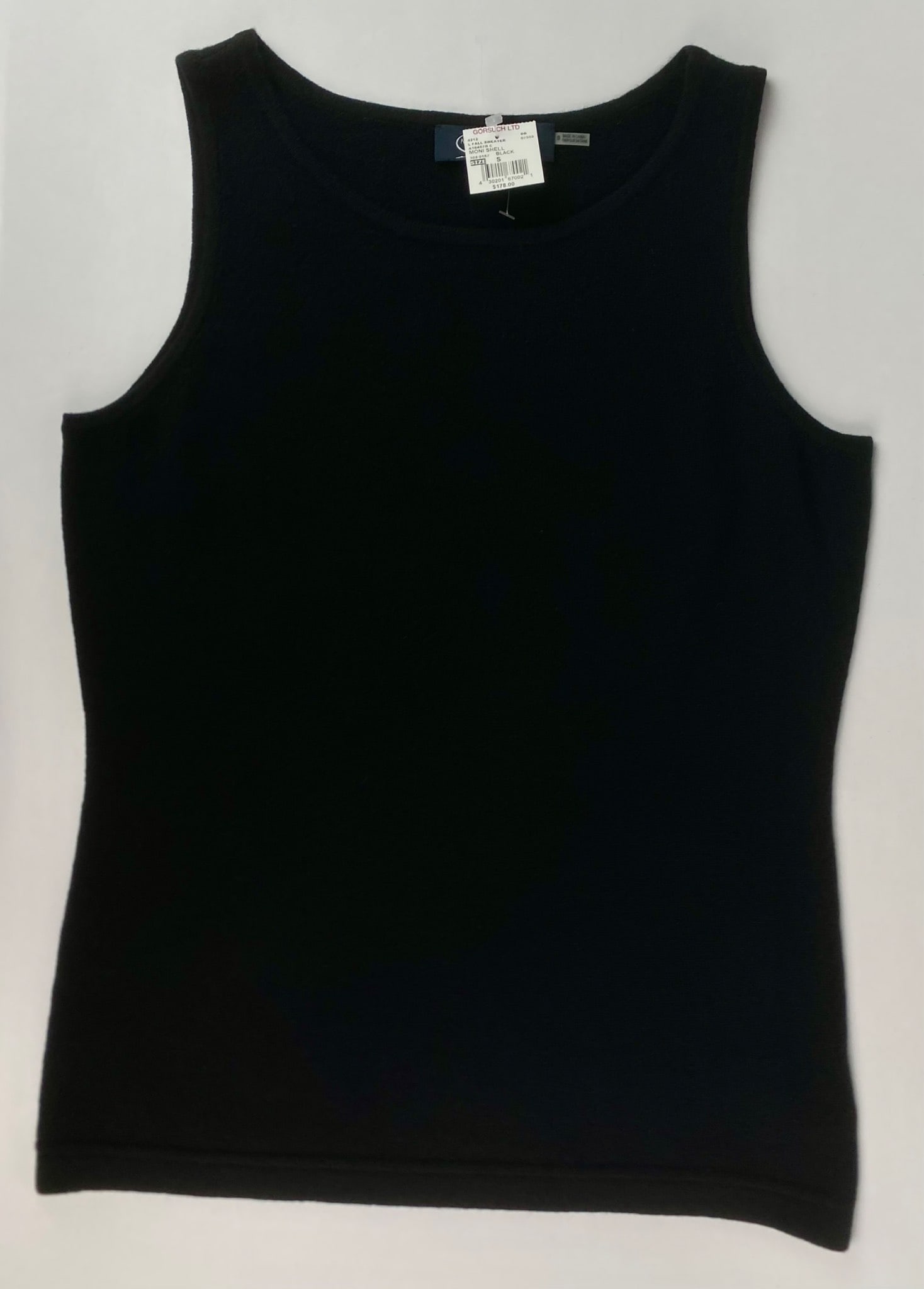 Magaschoni New York Black Cashmere Shell Sweater, Size S: Magaschoni New York sleeveless shell tank sweater in black, made from 100% cashmere. The soft knit features a classic round neckline and a fitted silhouette. Labeled size Small, with original Gorsuch