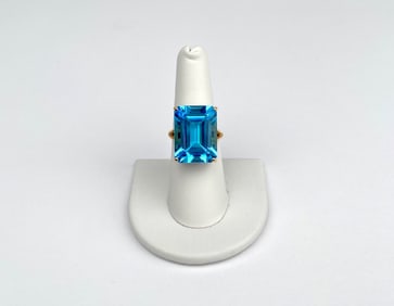 14K Yellow Gold Ring Featuring a Large Emerald-Cut Blue Topaz