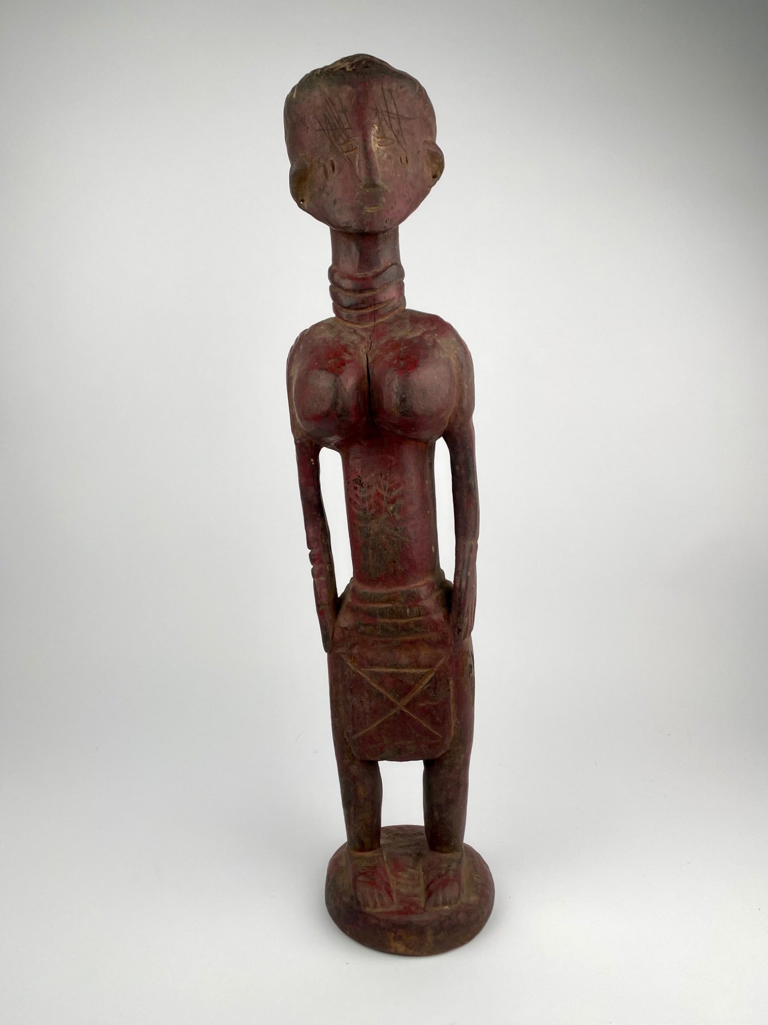 West African Carved Wooden Red Pigment Female Figure (1 of 12)