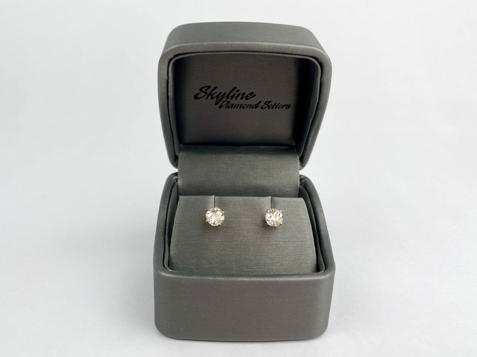 Pair of 14K Yellow Gold Old European Cut Diamond Stud Earrings: Pair of 14K yellow gold diamond stud earrings set with two Old European cut diamonds totaling approximately 1.61 carats. The diamonds are graded within the J-L color range with VS-1 clarity. Each diam