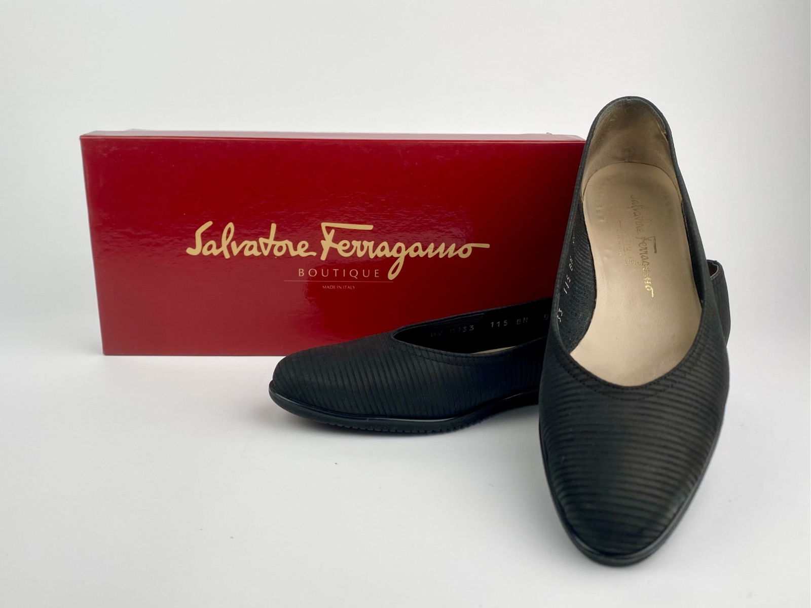 Salvatore Ferragamo Black Pebble Nubuck Flats, Size 9.5: Pair of Salvatore Ferragamo black pebble nubuck flats featuring a subtle textured finish, rounded toes, and low heels. Marked “Made in Italy,” the shoes are size 9.5 AA and include the origina
