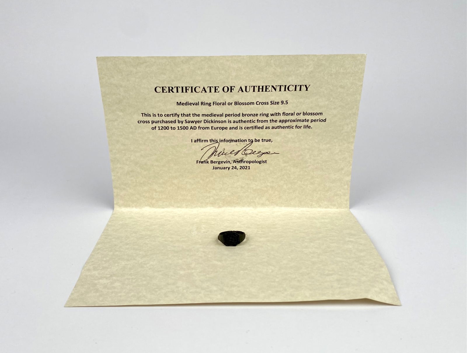 Medieval Bronze Ring with Floral Blossom Cross Design, 1200-1500 AD, COA: Medieval period bronze ring featuring a floral or blossom cross design. The ring dates to approximately 1200-1500 AD, Europe. Comes with a Certificate of Authenticity signed by an archeologist, Frank