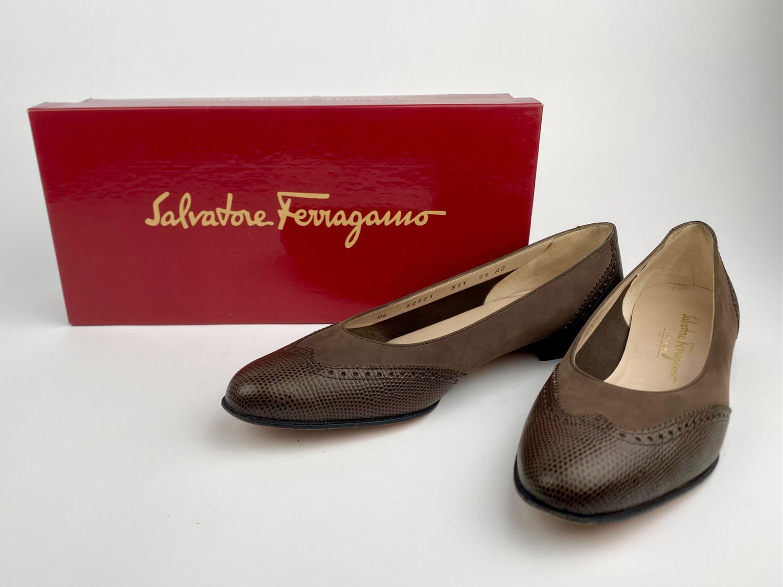 Salvatore Ferragamo Brown Leather Ballet Flats, Size 9.5: Pair of Salvatore Ferragamo brown leather ballet flats featuring textured leather cap toes with brogue-style detailing and smooth leather uppers. Marked “Made in Italy,” the shoes are size 9.5