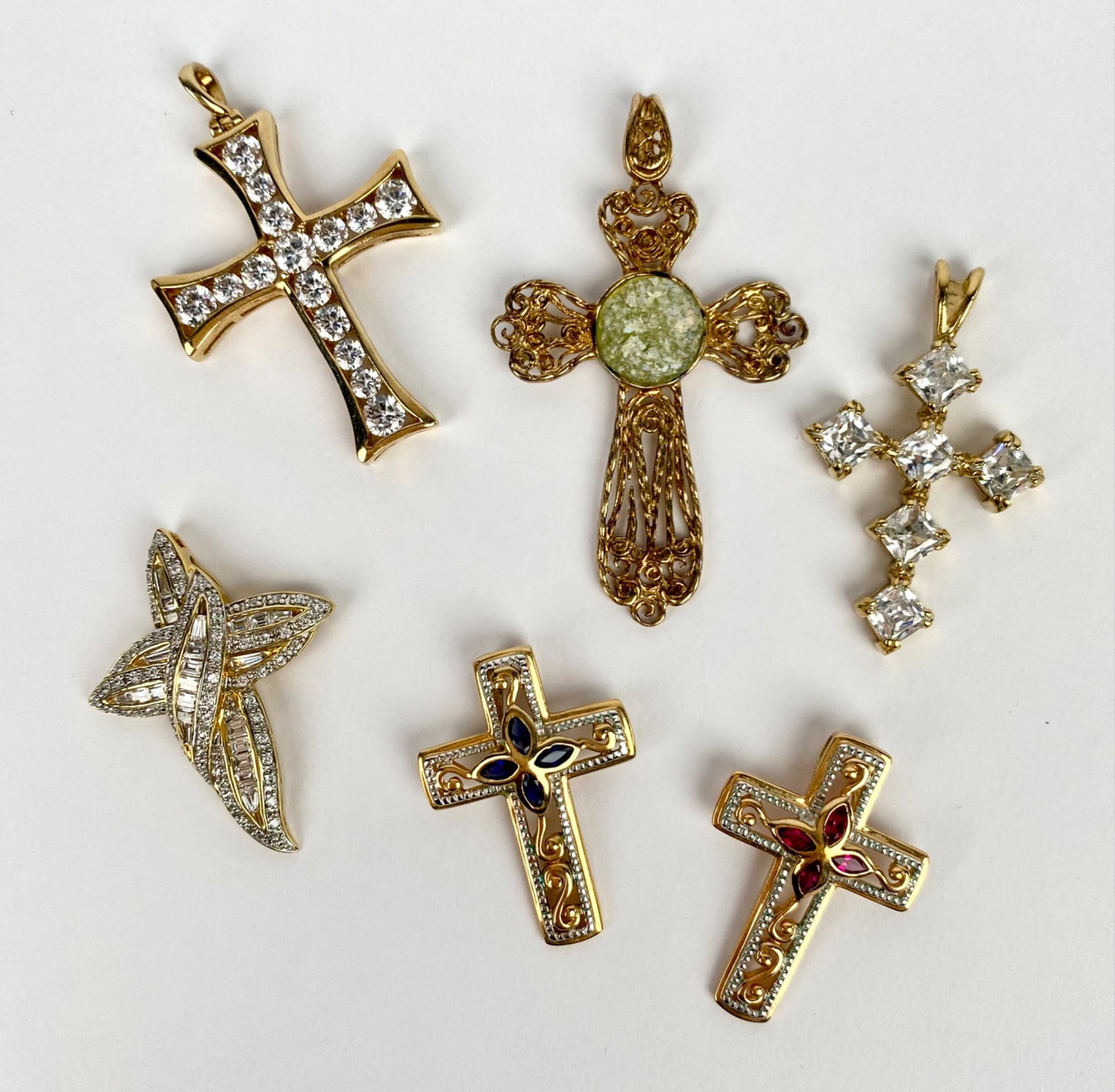 Six cross-shaped pendants, each crafted with detailed designs. All of the pendants are stamped '925' (1 of 10)