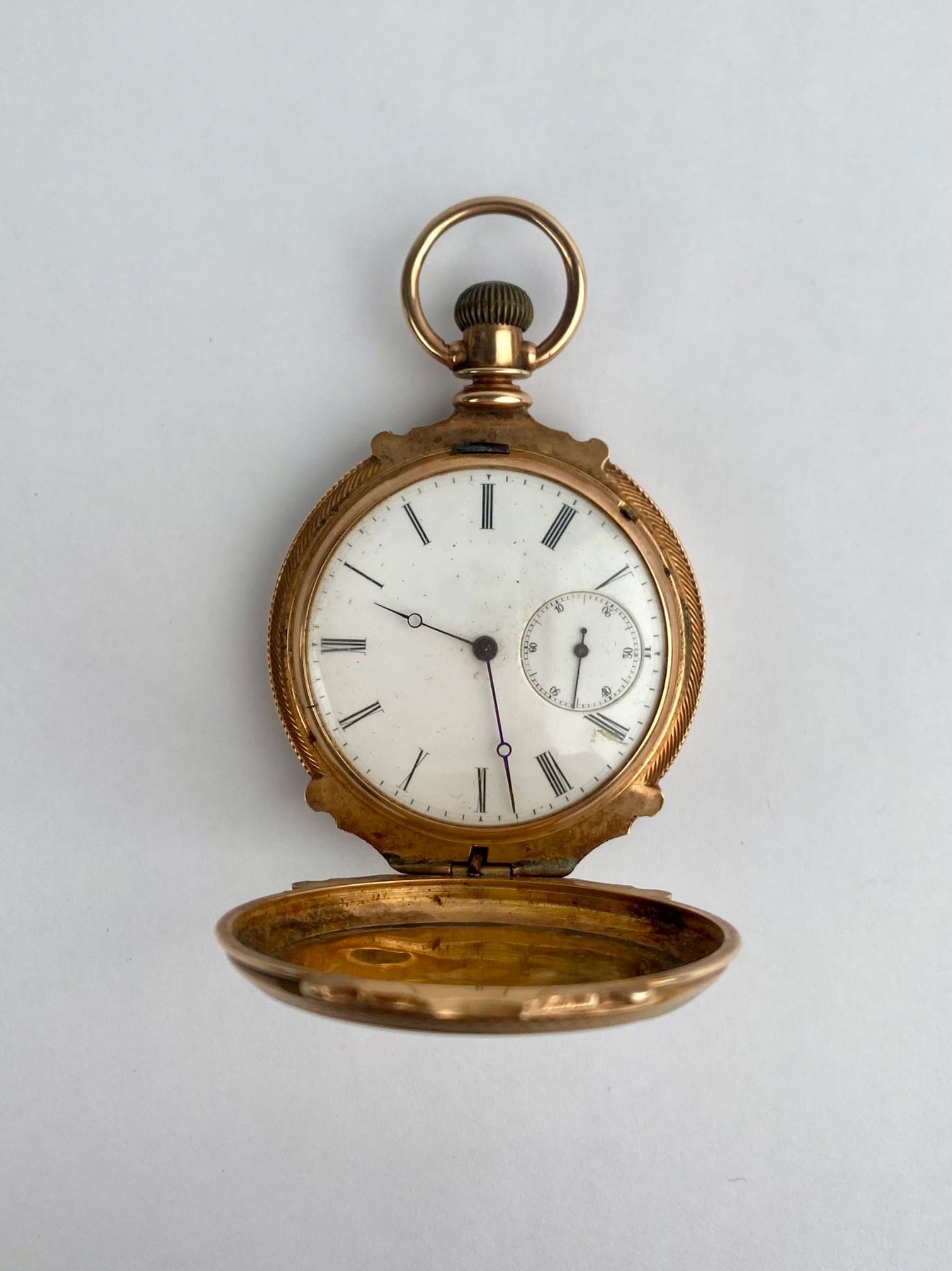 Antique pocket watch featuring an unsigned Swiss mechanical movement engraved "Adjusted" and (1 of 11)