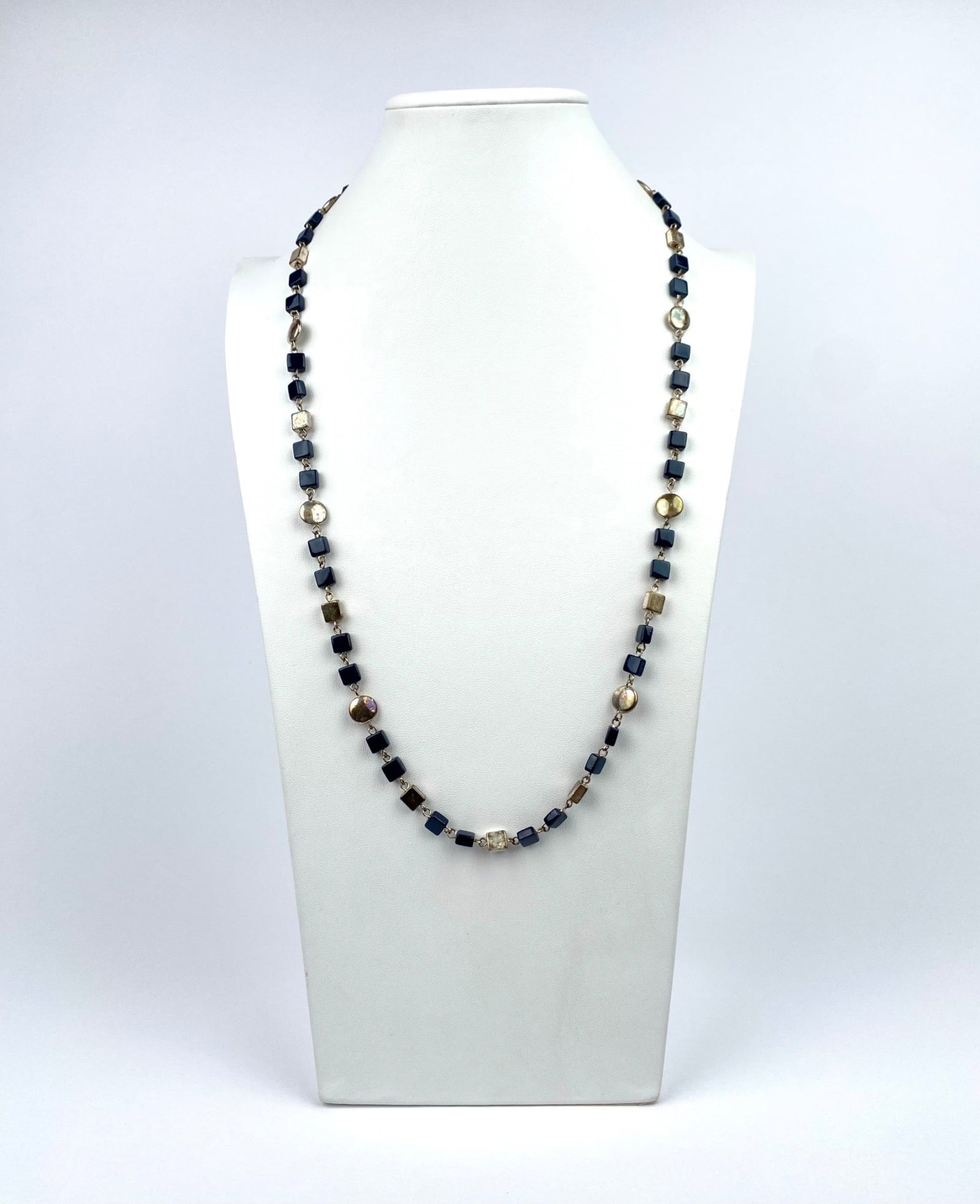 Worthington Silver-Tone Beaded Necklace: Worthington silver-tone necklace featuring blue square and oval accents. The necklace is secured with a lobster clasp and includes a small branded pendant near the clasp. The tag is marked 'Worthingto