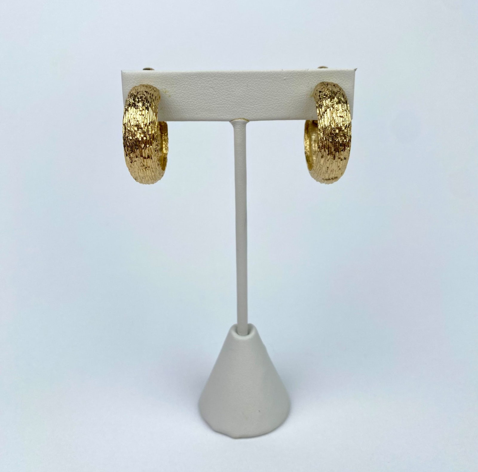 Vintage Gold-Tone Clip-On Hoop Earrings with Textured Finish: Gold-tone clip-on hoop earrings featuring a textured finish. Designed with a secure clip-on closure for non-pierced ears. | Please see photos for additional details. | Dimensions of One Earring: .75 i