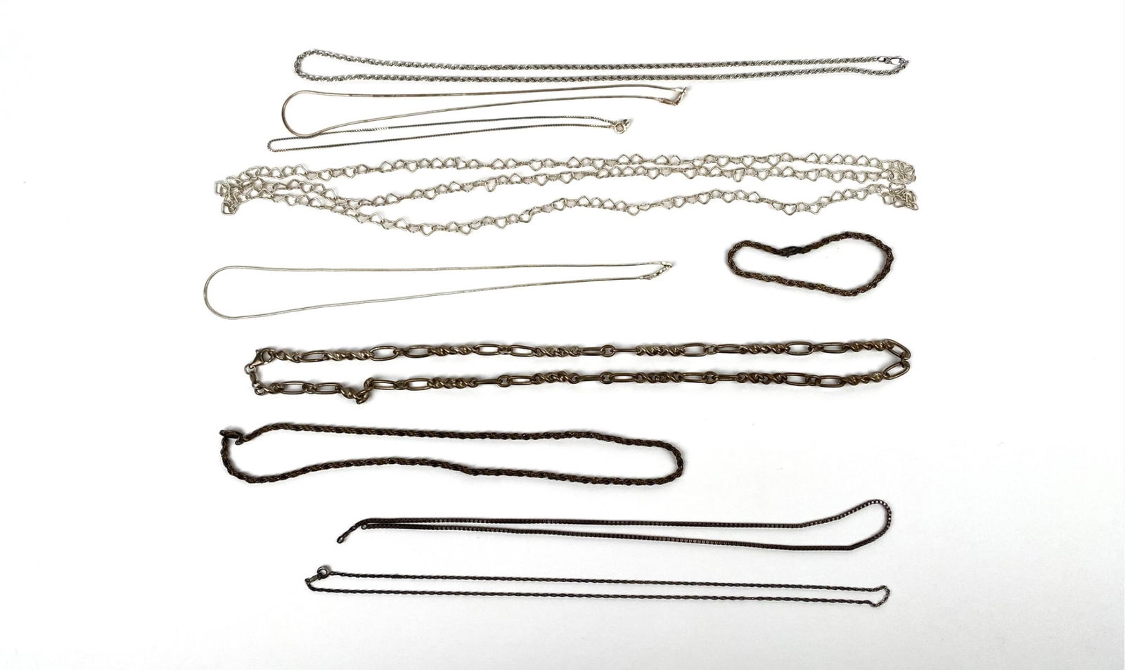 Sterling silver chains including various lengths, link styles, and designs. Some chains are marked (1 of 6)