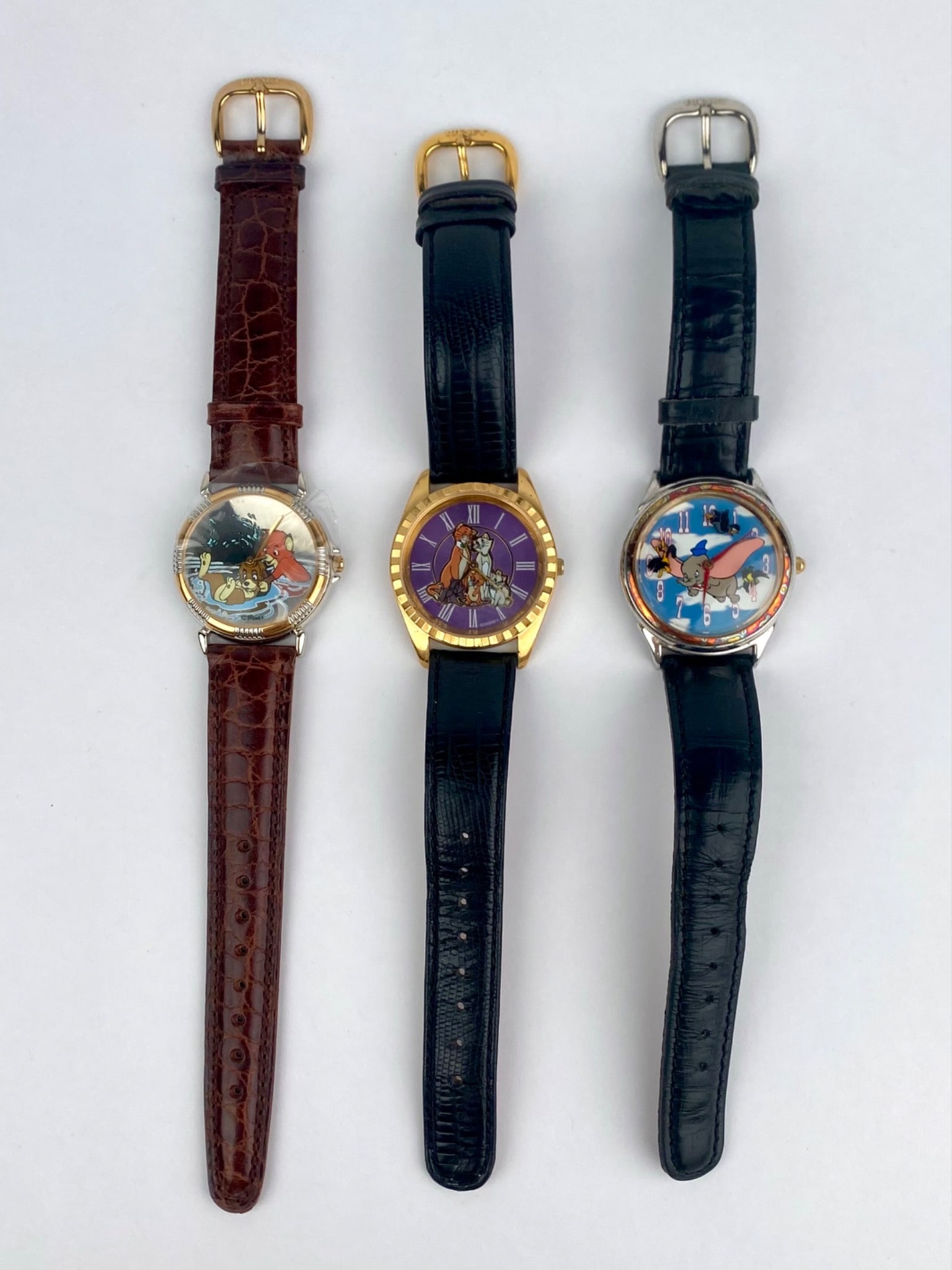 Lot includes three Disney Watch Collectors Club Series III Limited Edition wristwatches made: Lot includes three Disney Watch Collectors Club Series III Limited Edition wristwatches made exclusively for The Disney Store by Fossil. The first features "The Fox and the Hound" with Tod and Copper