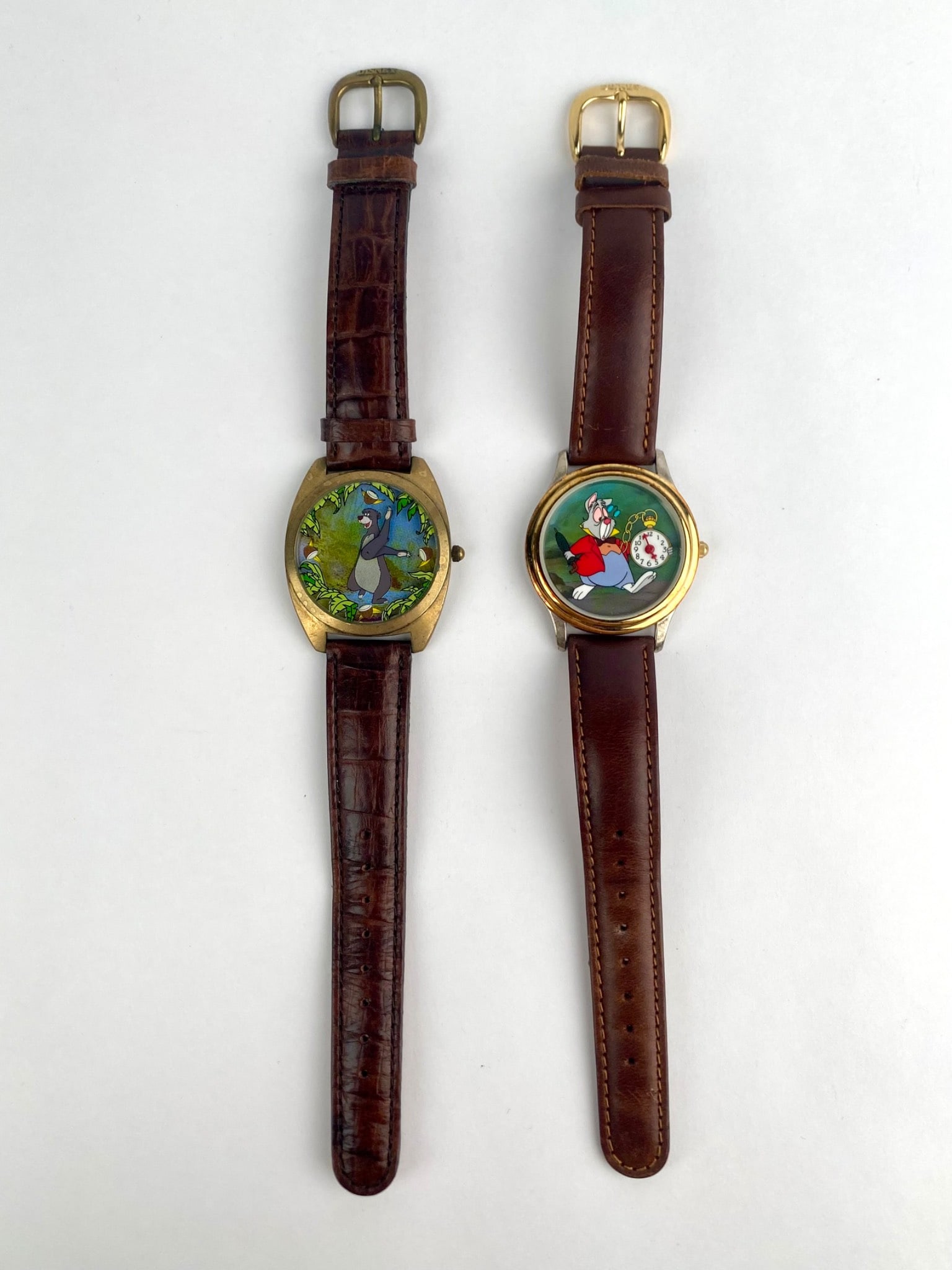 Pair of Disney Store Watch Collectors’ Club Series II Limited Edition Watches: Pair of Disney Store Watch Collectors' Club Series II limited edition wristwatches with brown genuine leather straps. The first watch features Baloo from The Jungle Book and is marked on the case back