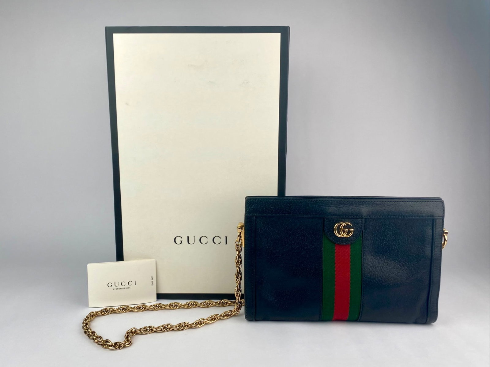 Gucci Ophidia leather chain shoulder bag, featuring black grained leather with the signature green (1 of 10)