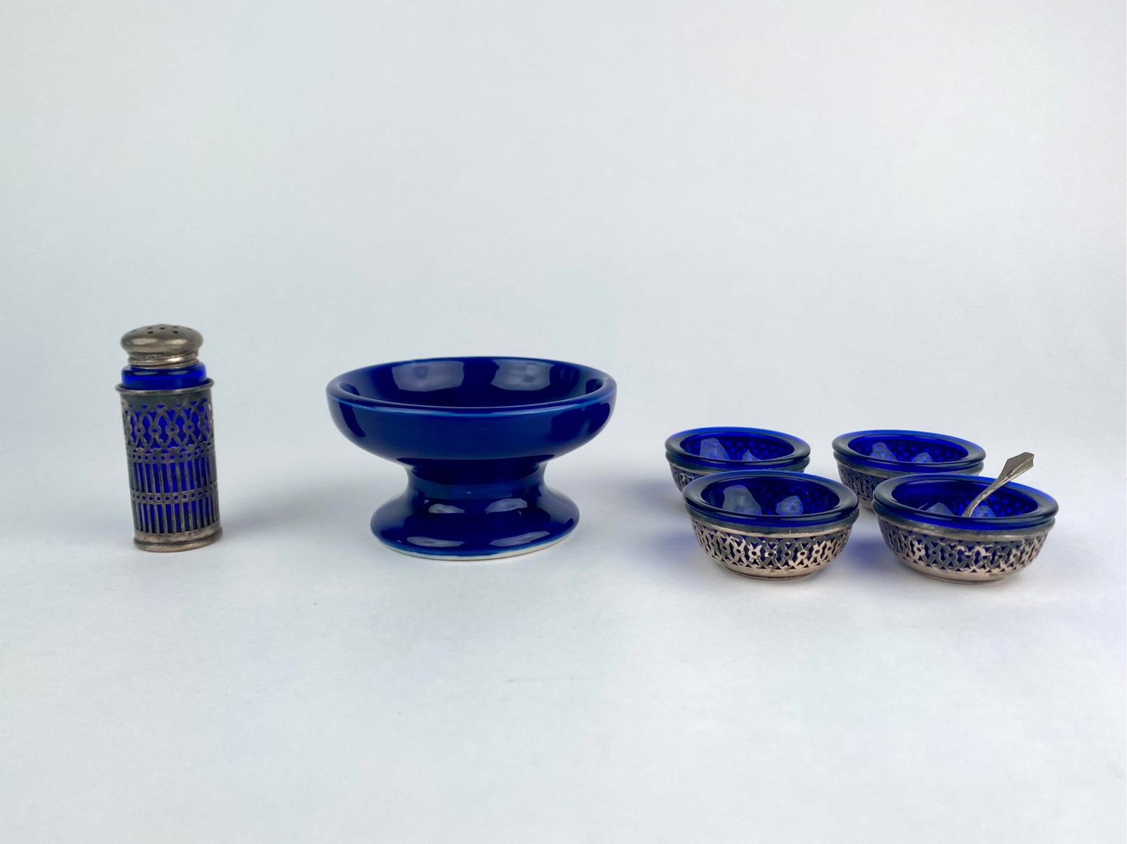 Cobalt blue glass condiment set consisting of four open salts with pierced sterling silver holders, (1 of 11)