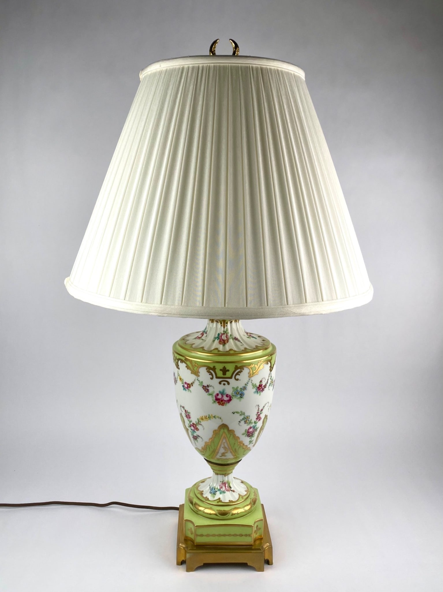 French-style porcelain urn-form table lamp featuring a celadon green ground with extensive gilt (1 of 12)