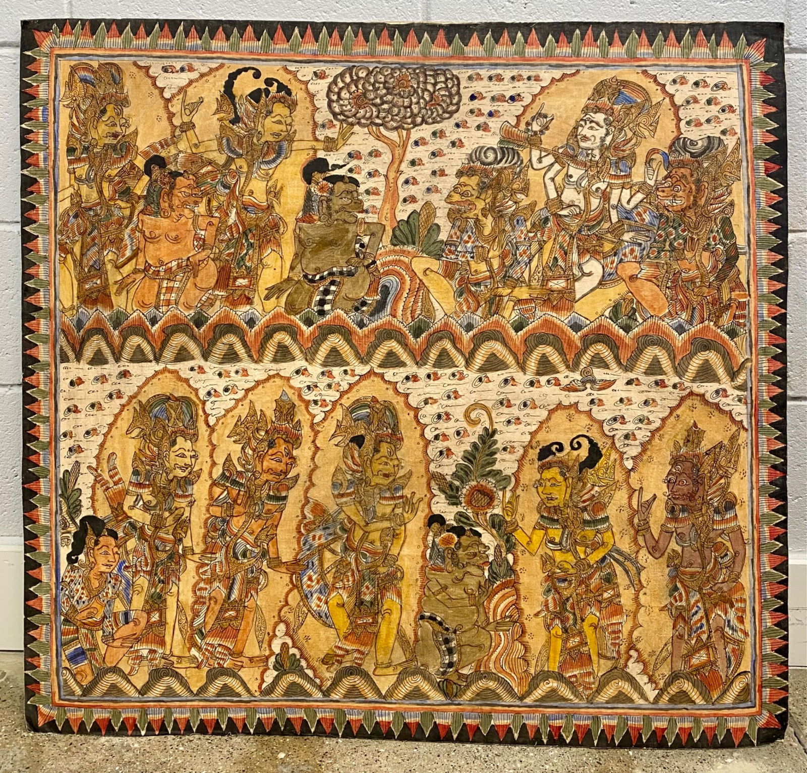 Balinese Kamasan Painting Depicting Wayang Figures on Cloth: Balinese Kamasan-style painting on cloth depicting Wayang figures arranged in two rows. The detailed artwork showcases characters from traditional shadow puppetry, rendered in vivid colors and intrica