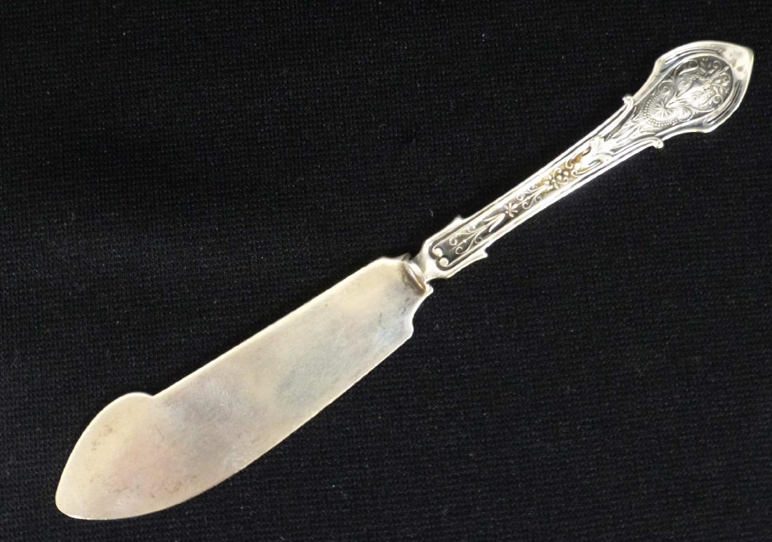 Wood & Hughes ANGELO Flat Sterling Master Butter Knife: From 1878 in the Angelo Patetrn, appro. 6 7/8" long. Great Patina, with minimal blade marks Name Monogram on reverse handle.