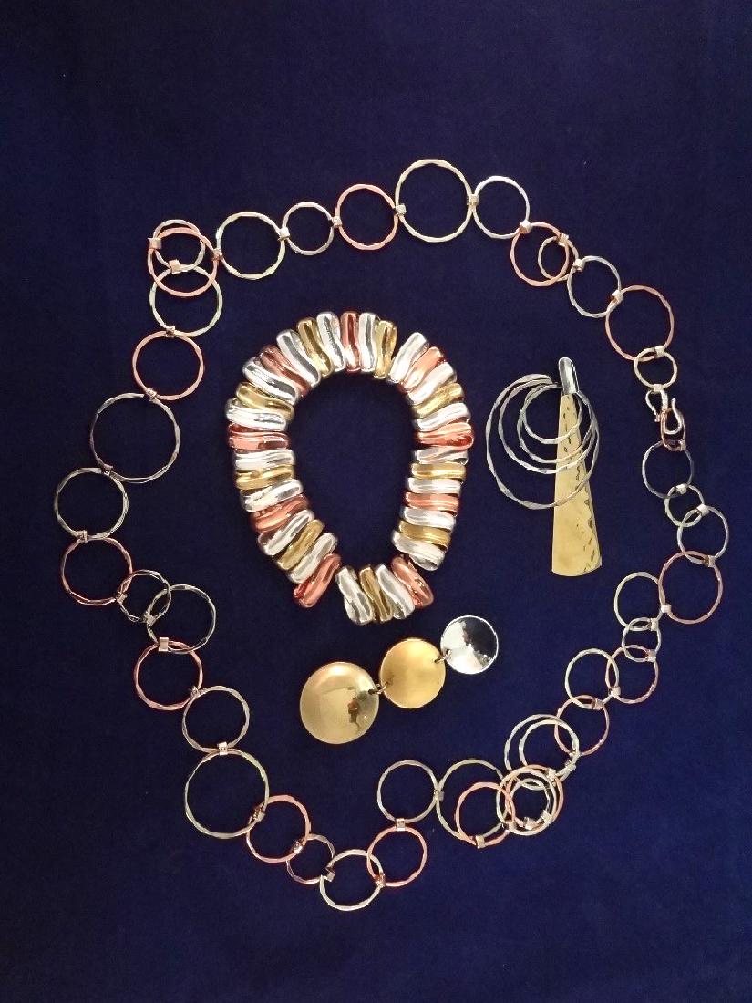 Robert Lee Morris Sterling Brass Copper Jewelry Group:: Robert Lee Morris Sterling Brass Copper Jewelry Group: Necklace, Bracelet, (2) Pendants: Necklace large loop links 36" long .70 troy ounces, Silver and copper pendant 3x2.75" .28 troy ounces. 3 drop d