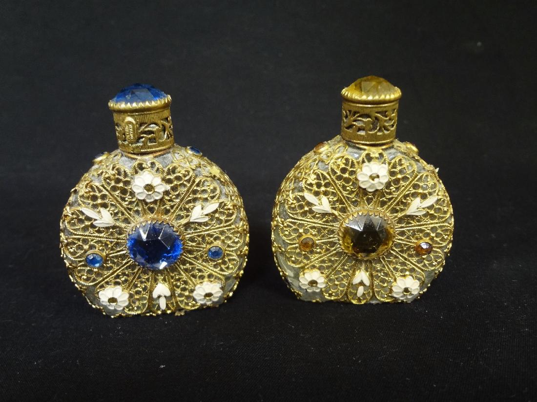 Czech Gold Filigree Jacket Rhinestone Perfumes: Czech Gold Filigree Jacket Rhinestone Perfumes: Embellished rhinestones in blue and yellow. Stands 2.25" with no condition issues.