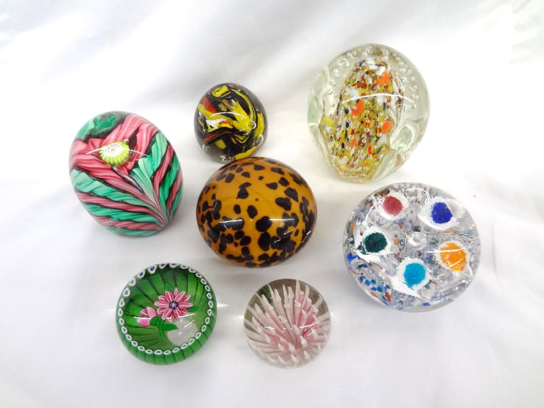 (7) Unsigned Glass Paperweights: caned, floral, others: (7) Unsigned Glass Paperweights: caned, floral, others: Tallest is 3.5" tall, no condition issues
