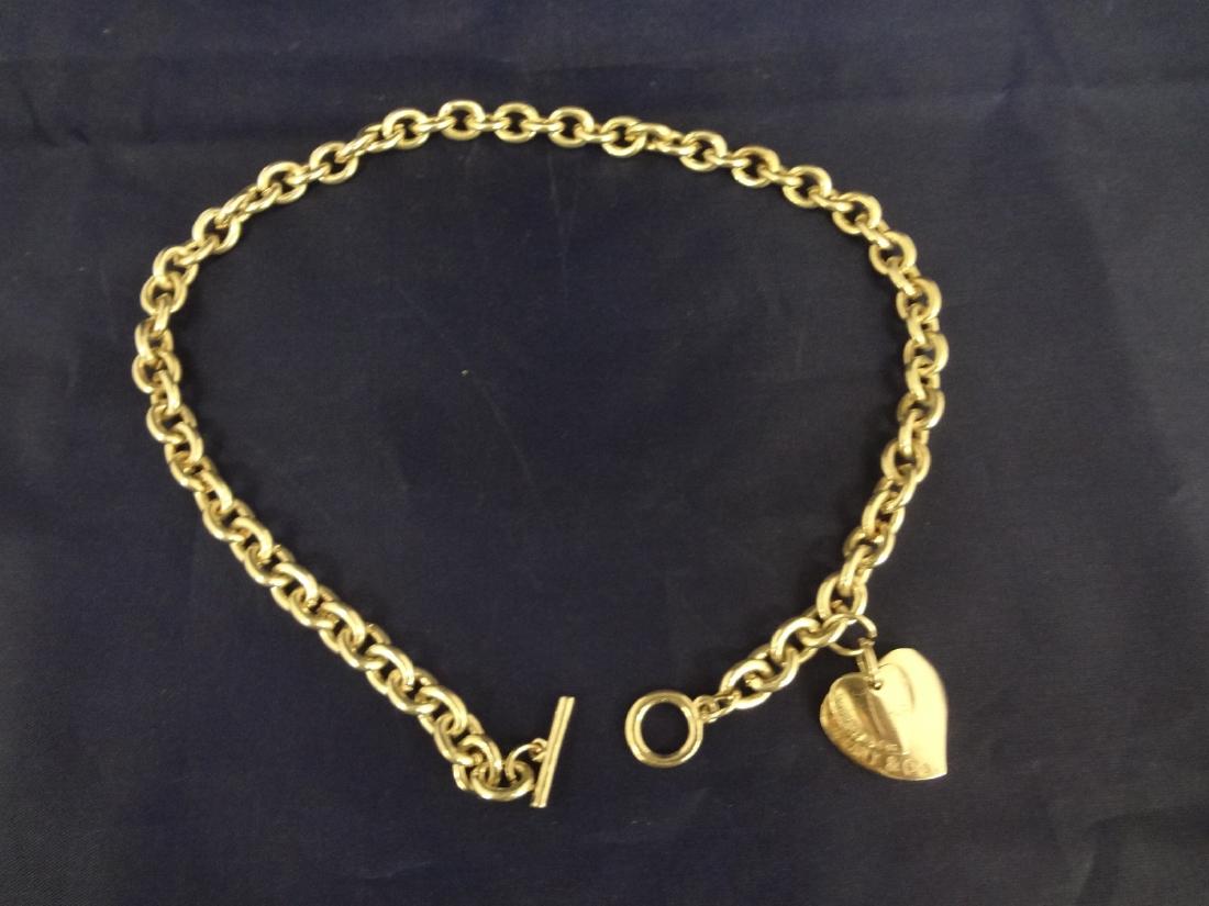 Tiffany and Company Sterling Silver Choker Heavy Link: Tiffany and Company Sterling Silver Choker Heavy Link with Hearts: Measures 17" in length and total weight is 66.7 grams. Two attached hearts signed Tiffany