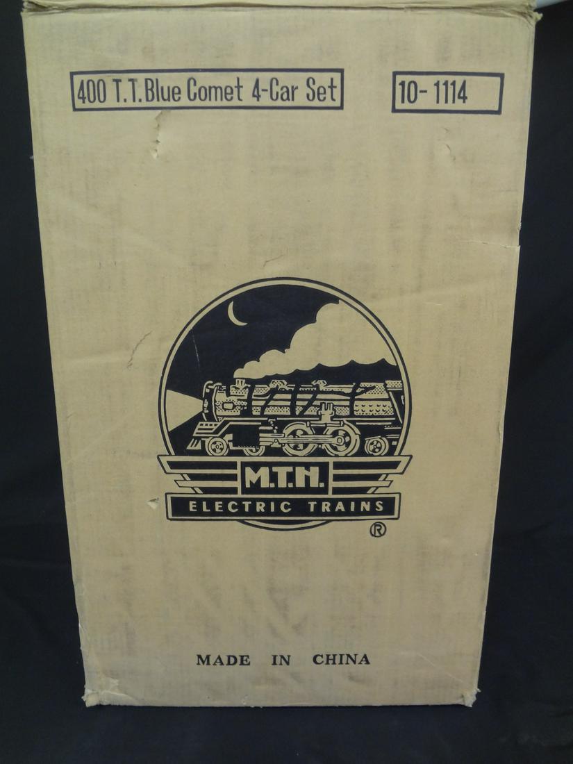 Tinplate Traditions Blue Comet 4 Car Set 10-1114 New in: Tinplate Traditions Blue Comet 4 Car Set 10-1114 New in Original Box: Includes: Westphal 421, Faye 420, Tempel 422, Halley 423. New in original boxes.