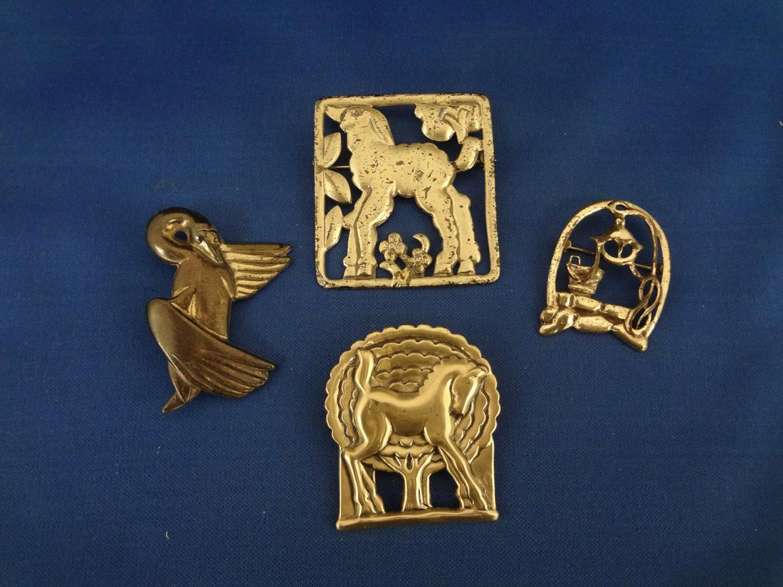 (4) McClelland Barclay Sterling Silver Brooches: (4) McClelland Barclay Sterling Silver Brooches: Horse, Swan, Well, and Sheep with largest measuring 2.25" in length.