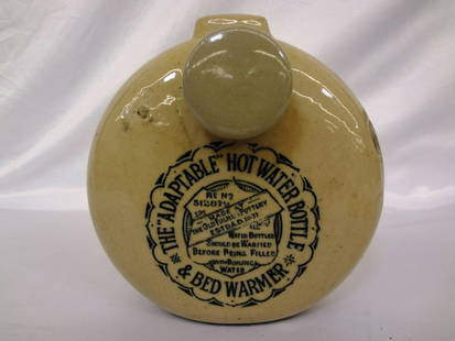 Timothy White Ltd. Adaptable Hot Water Bottle and Bed: Timothy White Ltd. Adaptable Hot Water Bottle and Bed Warmer Stoneware: Measures 7.5" diameter and 8" tall.