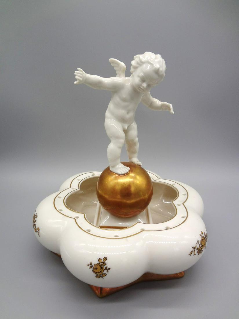 Hutschenreuther Karl Tutter Cherub Flower Frog: Hutschenreuther Karl Tutter Cherub Flower Frog: Original paper label, measures 9" tall, 9.5" wide. No condition issues.