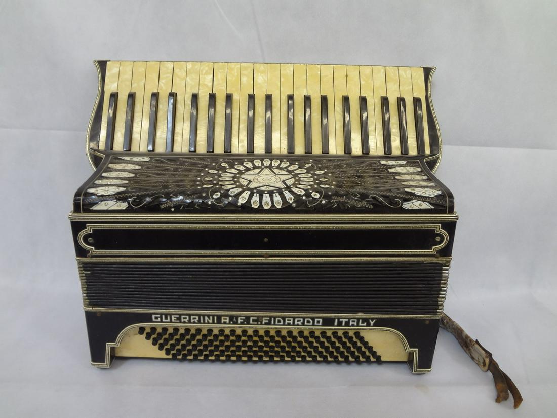 Guerrini & Co. Full Size Accordion Mother of Pearl: Guerrini & Co. Accordion Mother of Pearl Starburst: In excellent condition. Strap has damage, accordion in good working order.