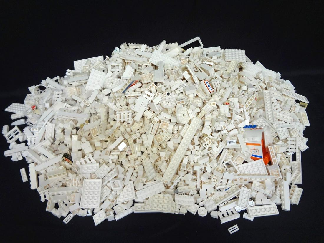 8.9 Pounds White Loose LEGO Bricks: 8.9 Pounds White Loose LEGO Bricks: Weighs 8.9 pounds, all different shades and shapes of white.