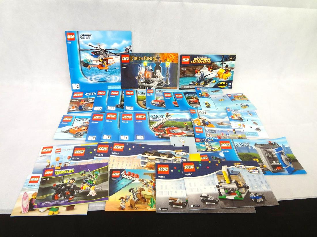 Large Group of LEGO Instruction Booklets: Large Group of LEGO Instruction Booklets: Included are 31 instruction booklets including CITY, Lord of the Rings and many others.