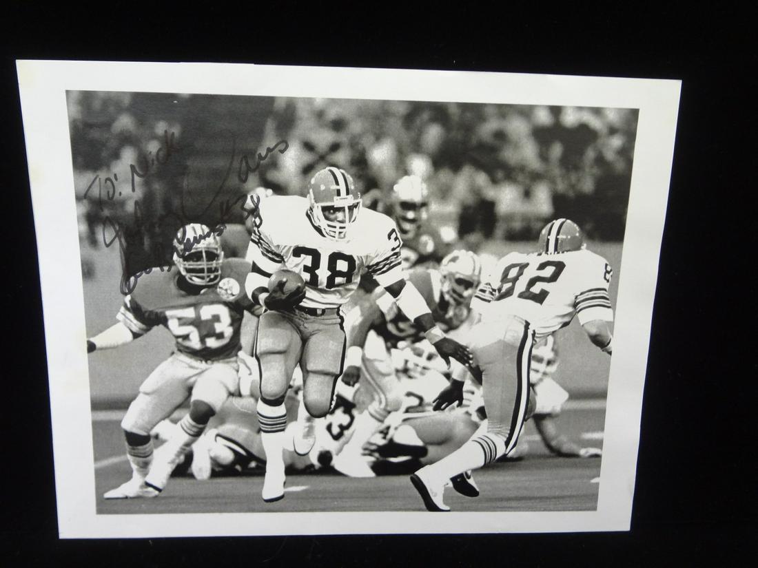 Johnny Davis Autographed Black and White 8 x 10 LOA: Johnny Davis Autographed Black and White 8 x 10 LOA from JSA: Signed and personalized by the Alabama & Cleveland Brown Running Back. Comes with LOA fro JSA