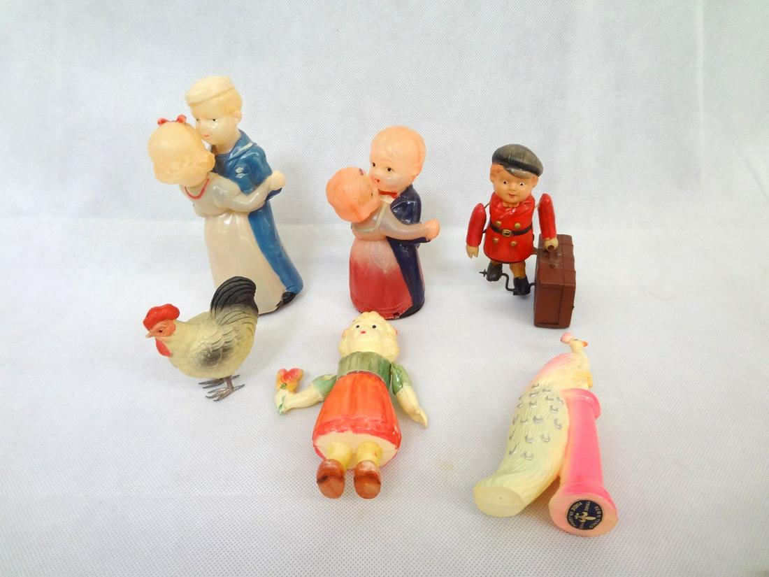 (6) Made in Occupied Japan Wind Ups and Rattles: (6) Made in Occupied Japan Wind Ups and Rattles: (2) Dancers 6" and 4.5", 1 boy with suitcase, (3) rattles.