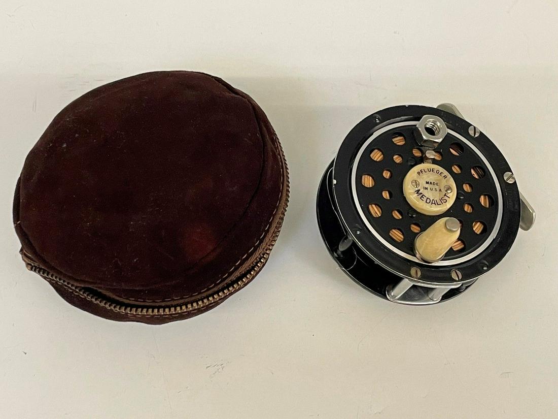 Pfleuger Fly Fishing Reel in Cloth Holder (1 of 3)