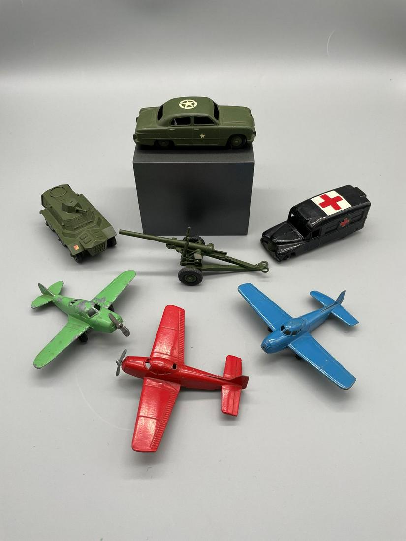 (4) Dinky Toys, and (3) Tootsie Toys Planes, Cars: (4) Dinky Toys, and (3) Tootsie Toys Planes, Cars: Dinky Toys include: Ford Sedan army car, armored personnel carrier, daimler ambulance, 55 medium gun. Tootsie toys include blue navion missing its pr