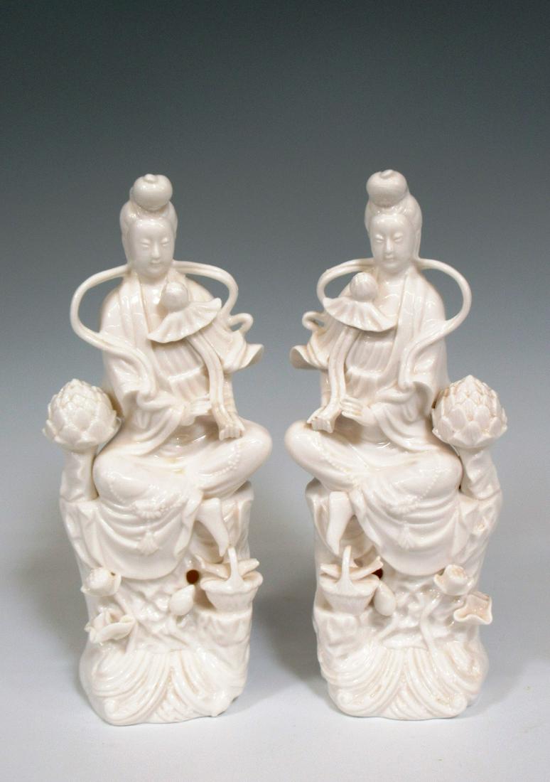 Pair of Porcelain Goddess Kwan Yin Vases: Pair of Porcelain Goddess Kwan Yin and Lotus Flower Vases measures 11" in height and have no condition issues. The vases makers mark is L&M.