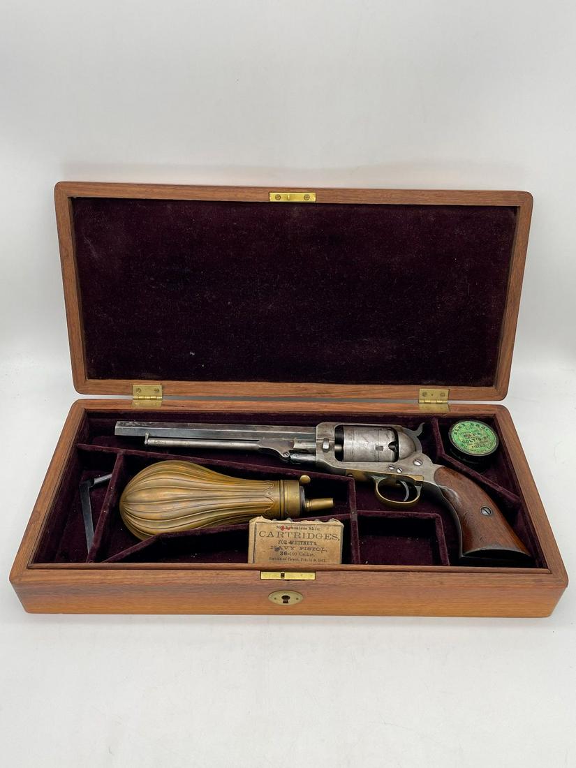 Cased E. Whitney New Haven Navy .36 Caliber Revolver: Cased E. Whitney New Haven Navy .36 Caliber Revolver: This fine revolver is presented in a Walnut case that holds the revolver, a nipple wrench, a powder flask, an empty tin of caps, and a pack of car