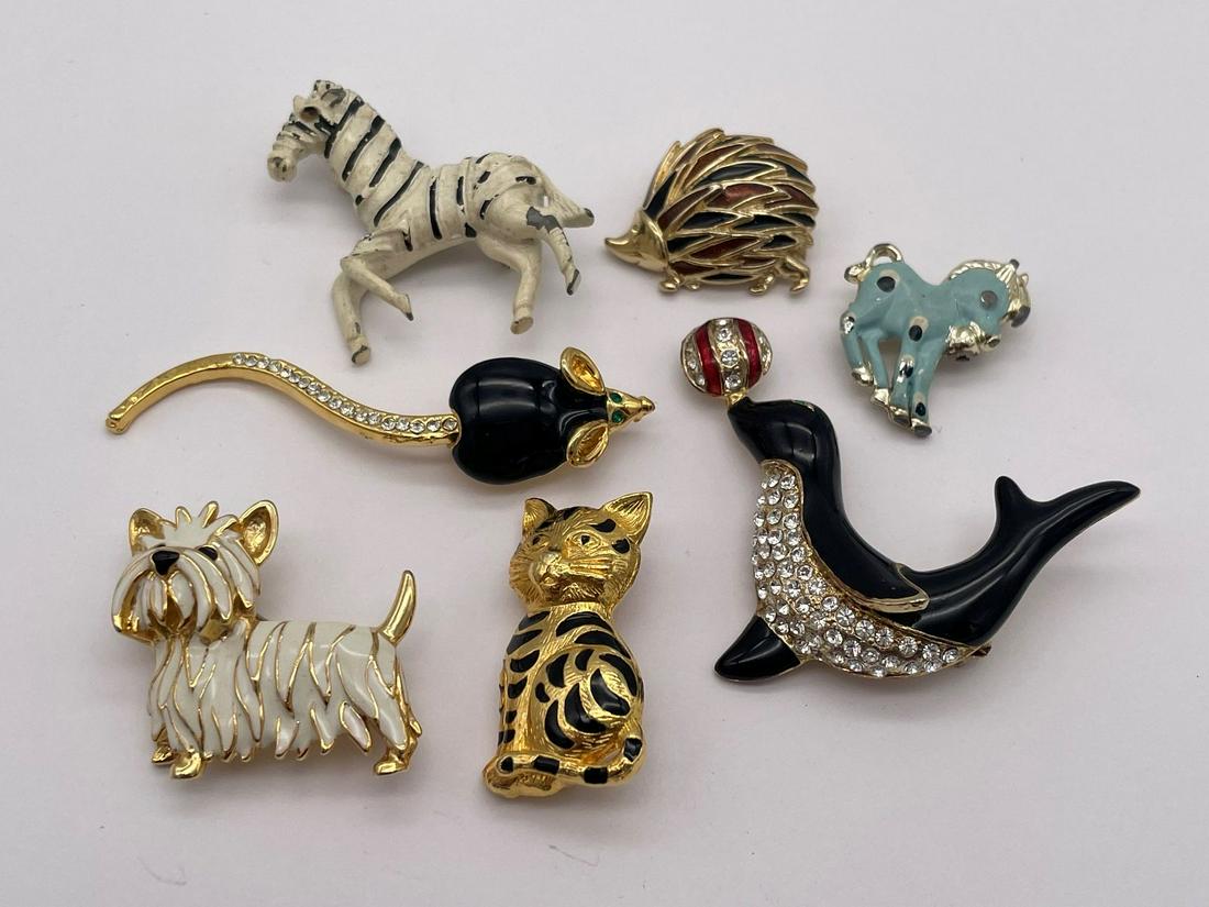 (7) Enameled Costume Brooches: (7) Enameled Costume Brooches: includes seal with rhinestones, mouse with rhinestones, cat, zebra hedgehog, scottie dog, horse.