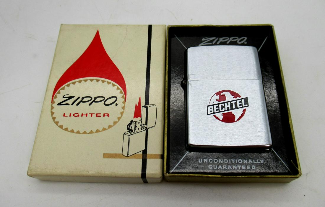 1966 Zippo Lighter: 1966 Zippo Lighter with brush finish. Engraved with Bechtel and includes original box.