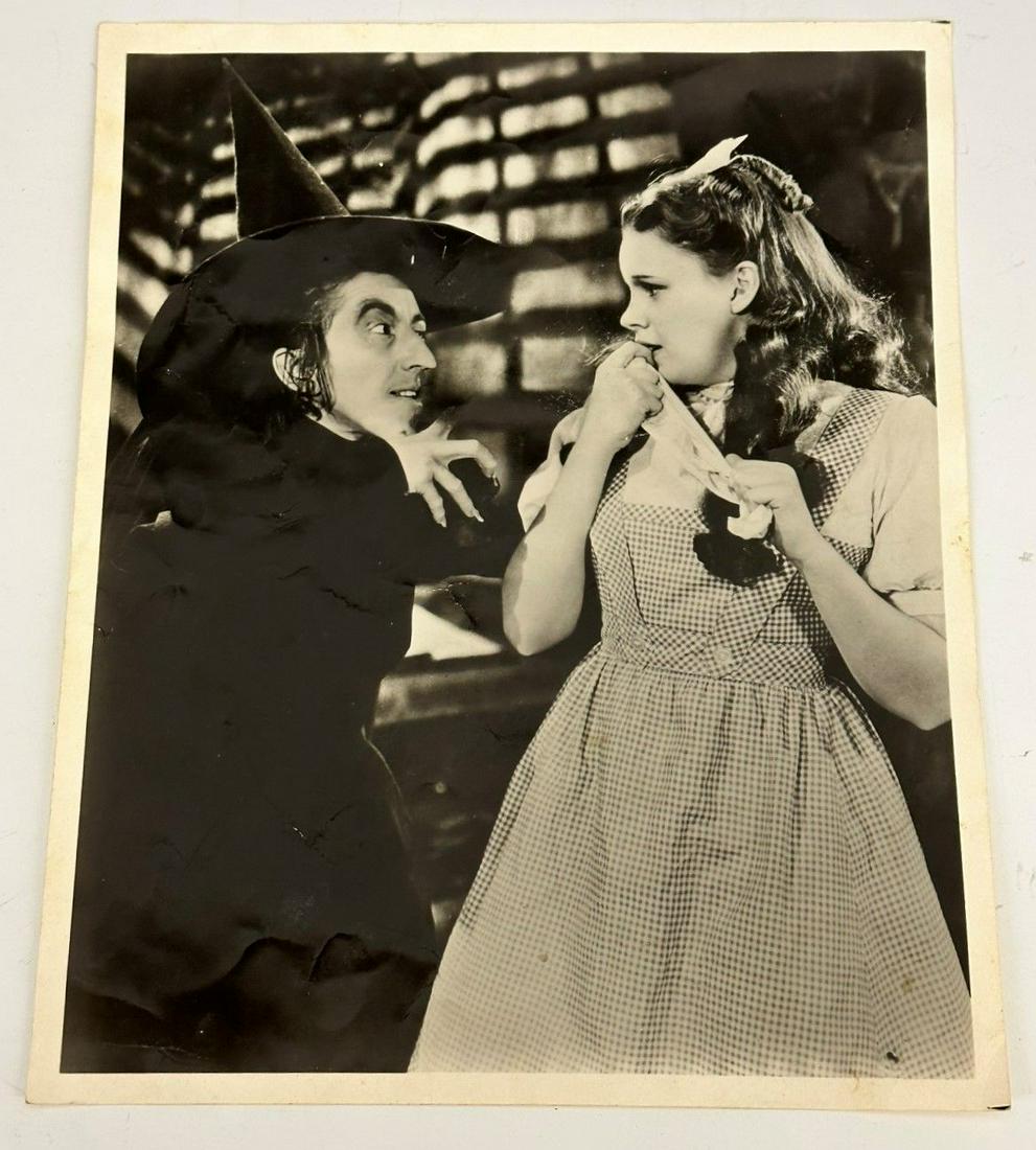 Dorothy and The Wicked Witch of the West Movie Still: Dorothy and The Wicked Witch of the West Movie Still. The 1939 MGM film, The Wizard of Oz stars Judy Garland and Margaret Hamilton. This is an 8 x 10 glossy photo.