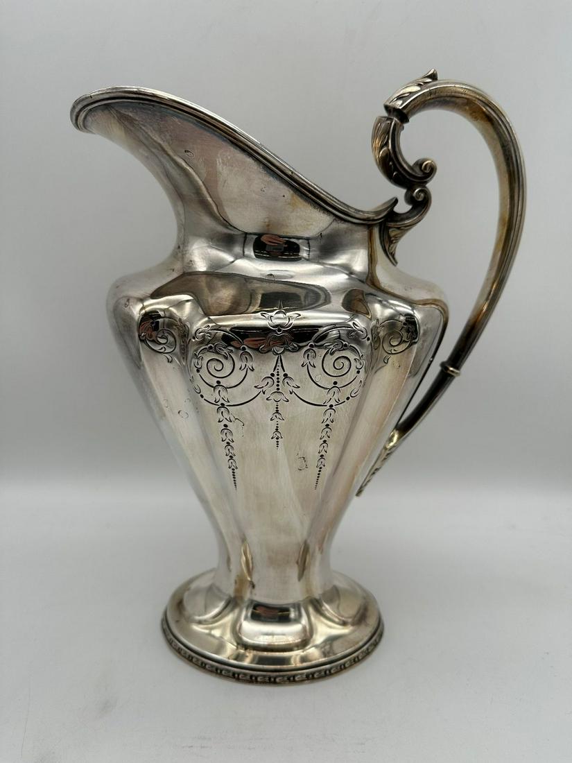 Georgian 18% Nickle Silver Water Pitcher: Georgian 18% Nickle Silver Water Pitcher: 11" tall.