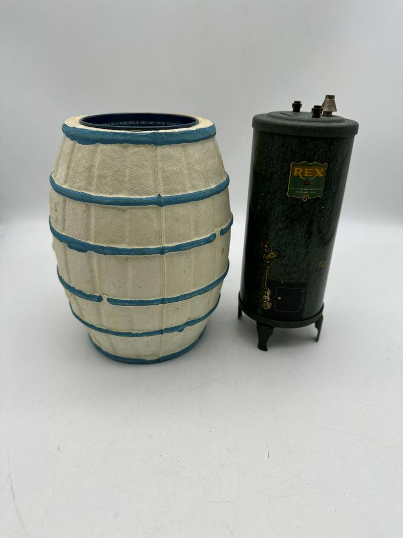 (2) Miscellaneous Still Banks: Heater, Salt Water Taffy: (2) Miscellaneous Still Banks: Heater, Salt Water Taffy: Rex The Cleveland Heater Co. 7.5", Salt Water Taffy Paper Mache Barrel Bank 7".