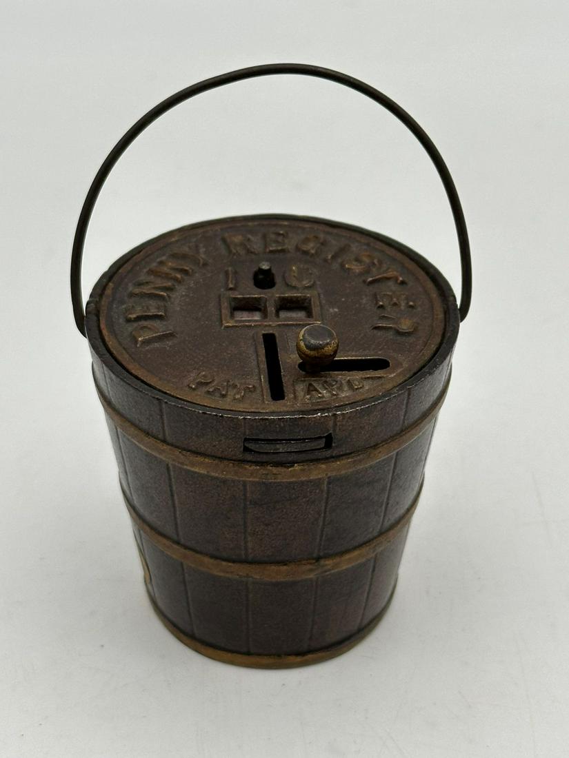 Kyser and Rex Penny Register Pail Cast Iron Still Bank 1889: Kyser and Rex Penny Register Pail Cast Iron Still Bank 1889: Measures 2.75" tall, with original paper label on bottom.
