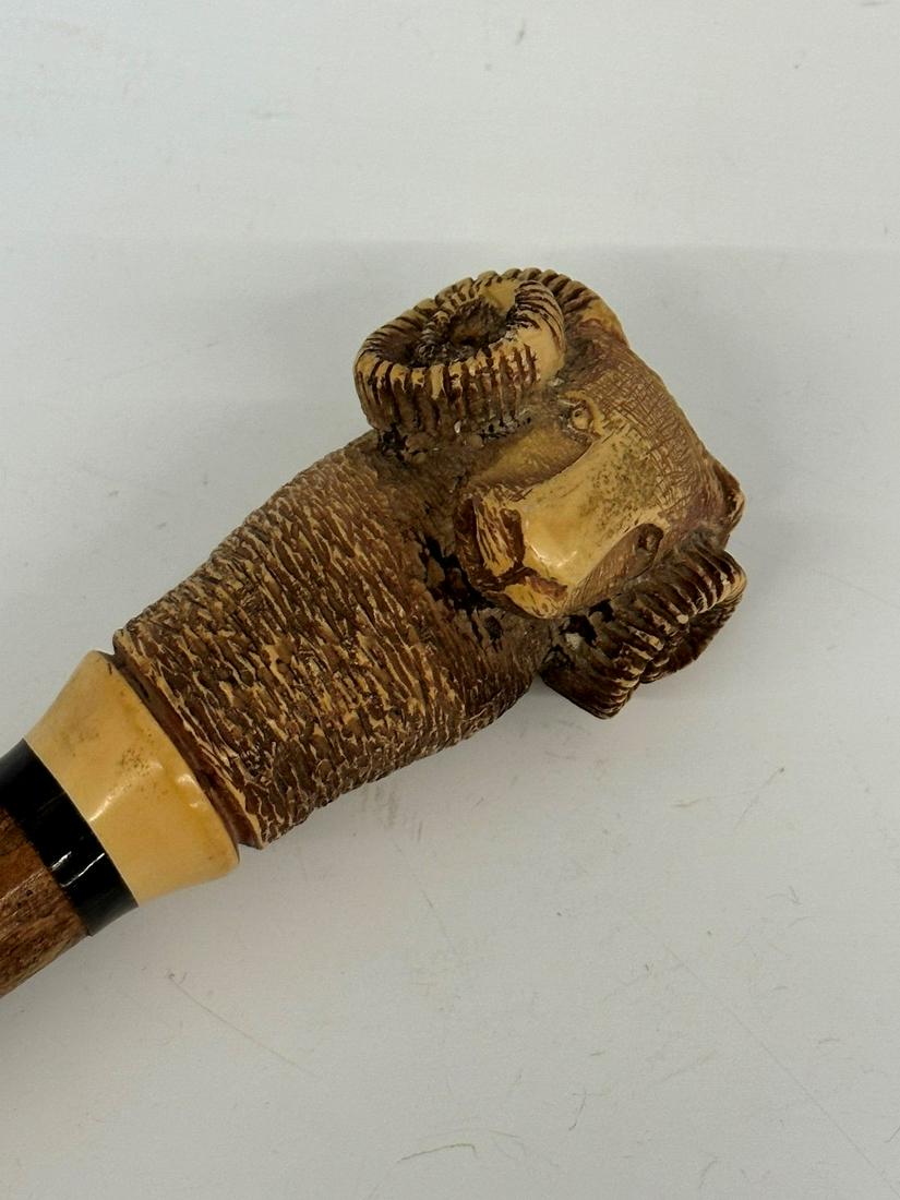 Carved Bone Ram's Head Walking Stick Cane: Carved Bone Ram's Head Walking Stick Cane: Measures 37" long.