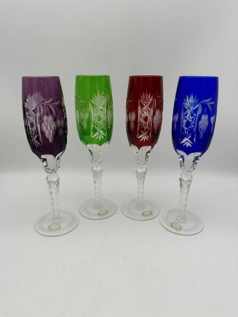 (4) Hungary Cut to Clear Colored Champagne Flutes: (4) Hungary Cut to Clear Colored Champagne Flutes: Purple, green, red and blue. Measure 9" tall.